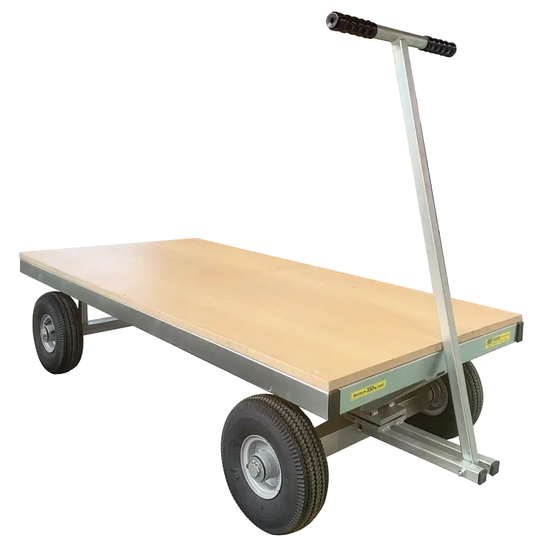 Flat-Deck Turntable Trolley with a timber deck and long handle for pulling with ease.